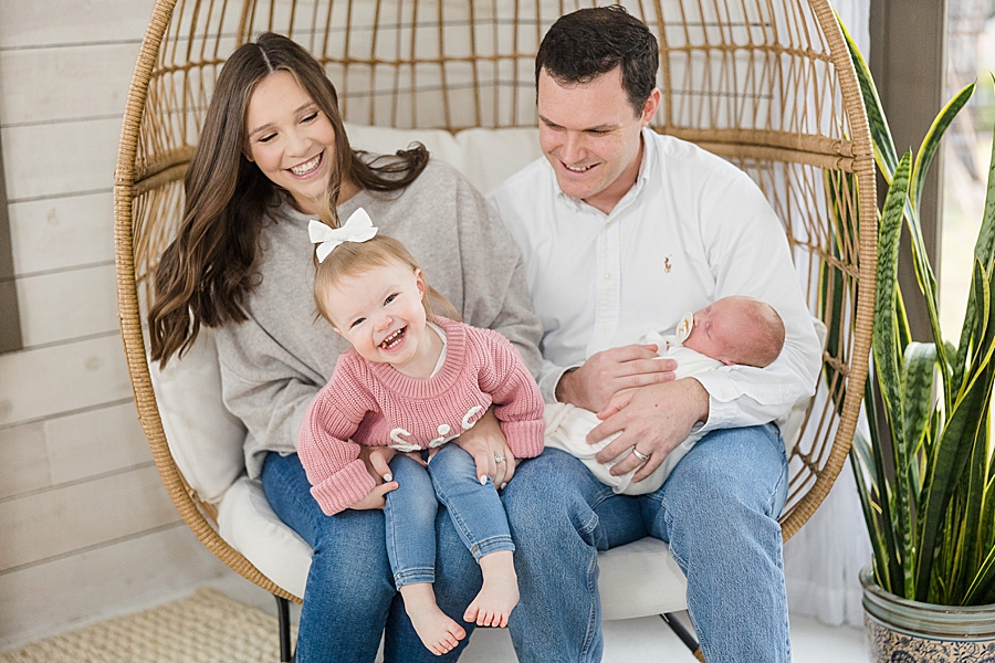 family of four at newborn session