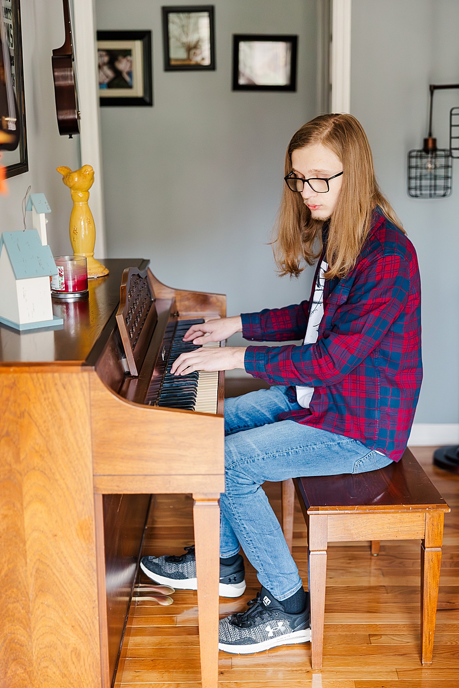 young man playing piano