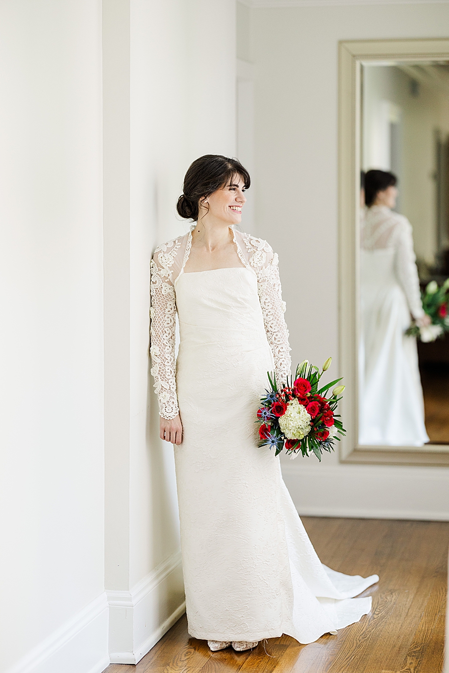 bride leaning against wall at maple grove bridal session