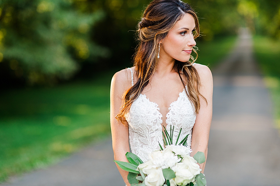 bride holding bouquet at maple grove bridal session