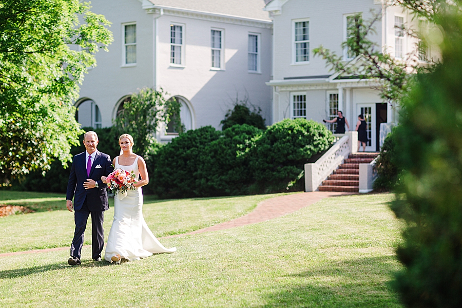 walking down the aisle at maple grove estate