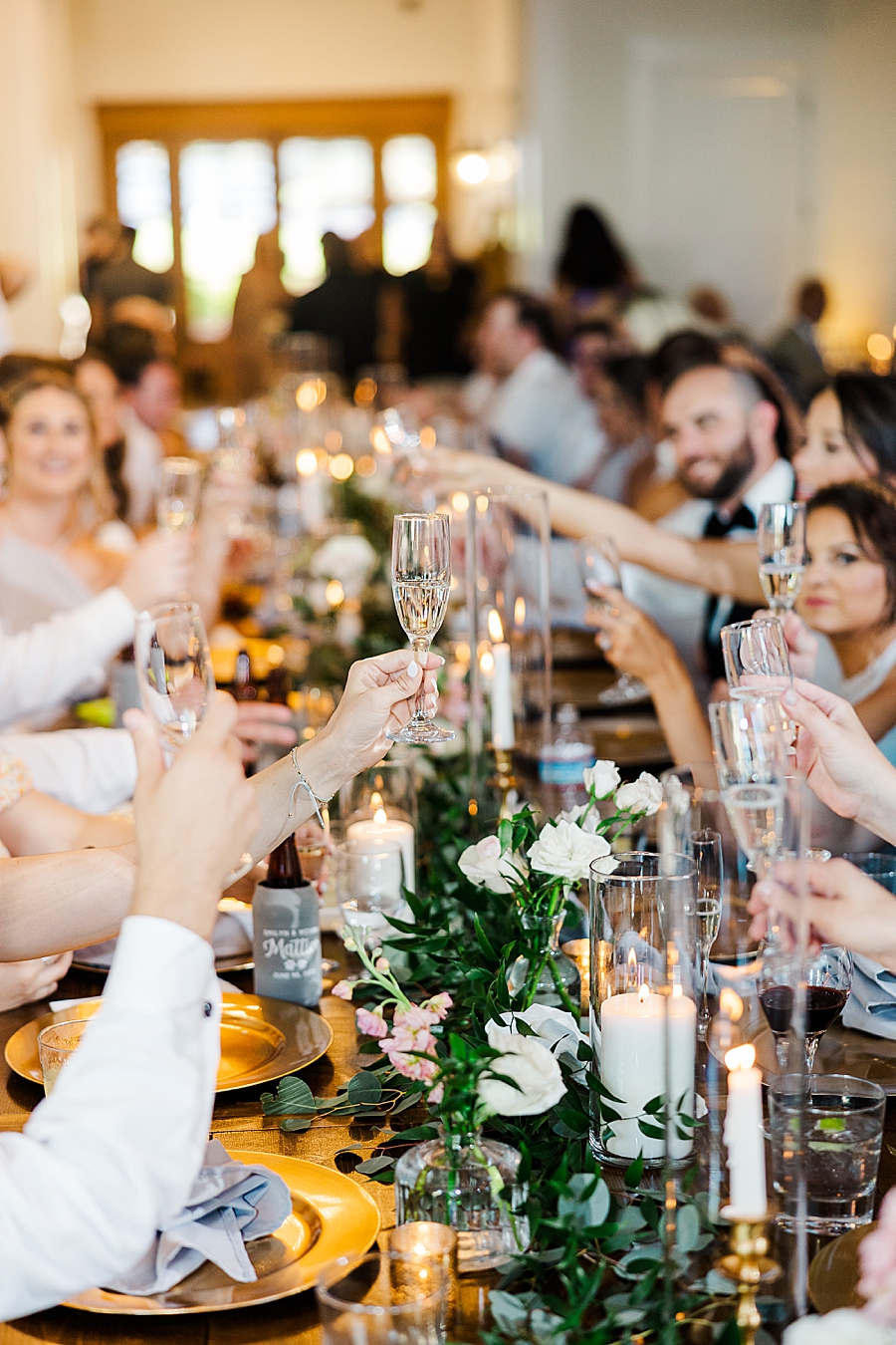 guests toasting glasses