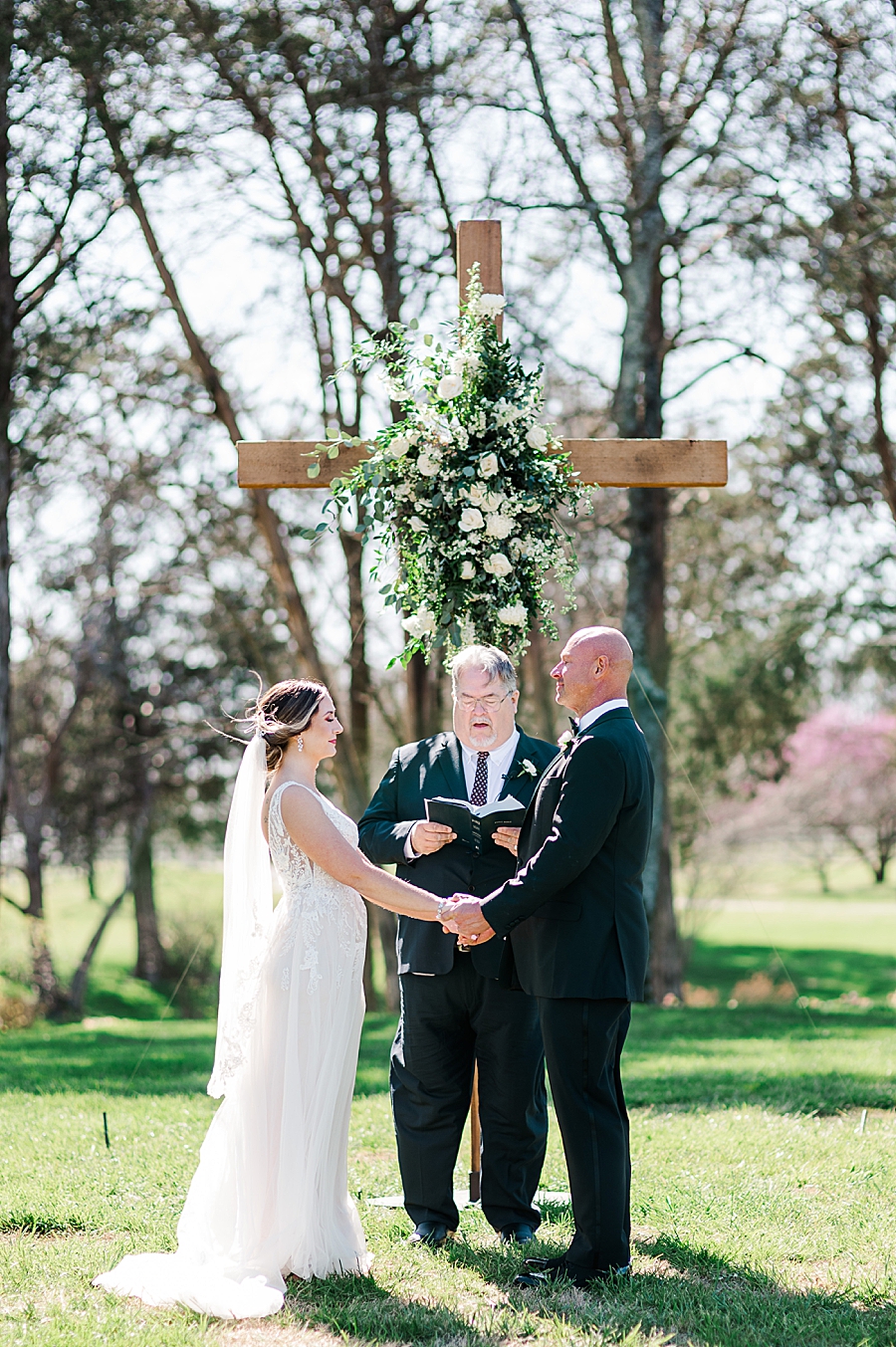 exchanging vows at marblegate farm associate wedding