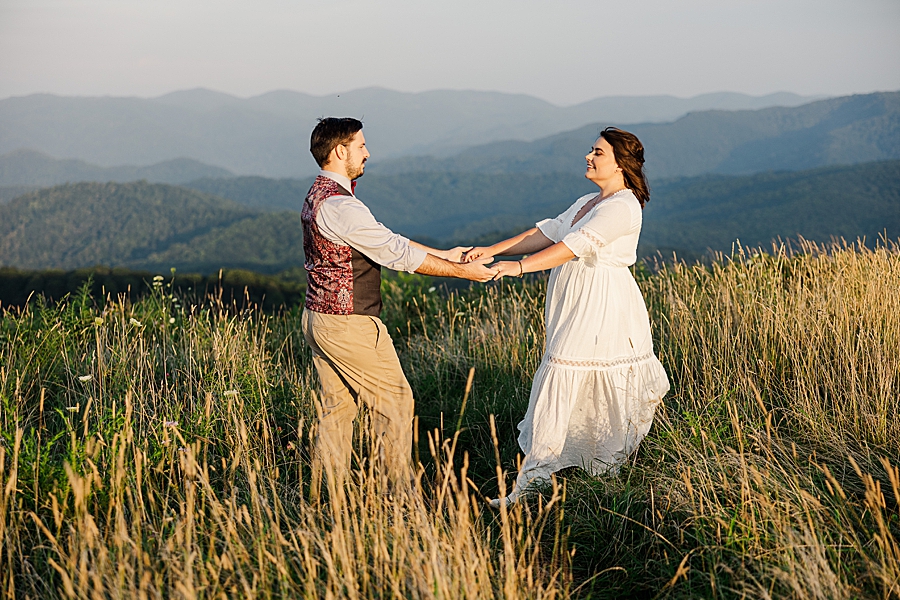 couple dancing at max patch sunset