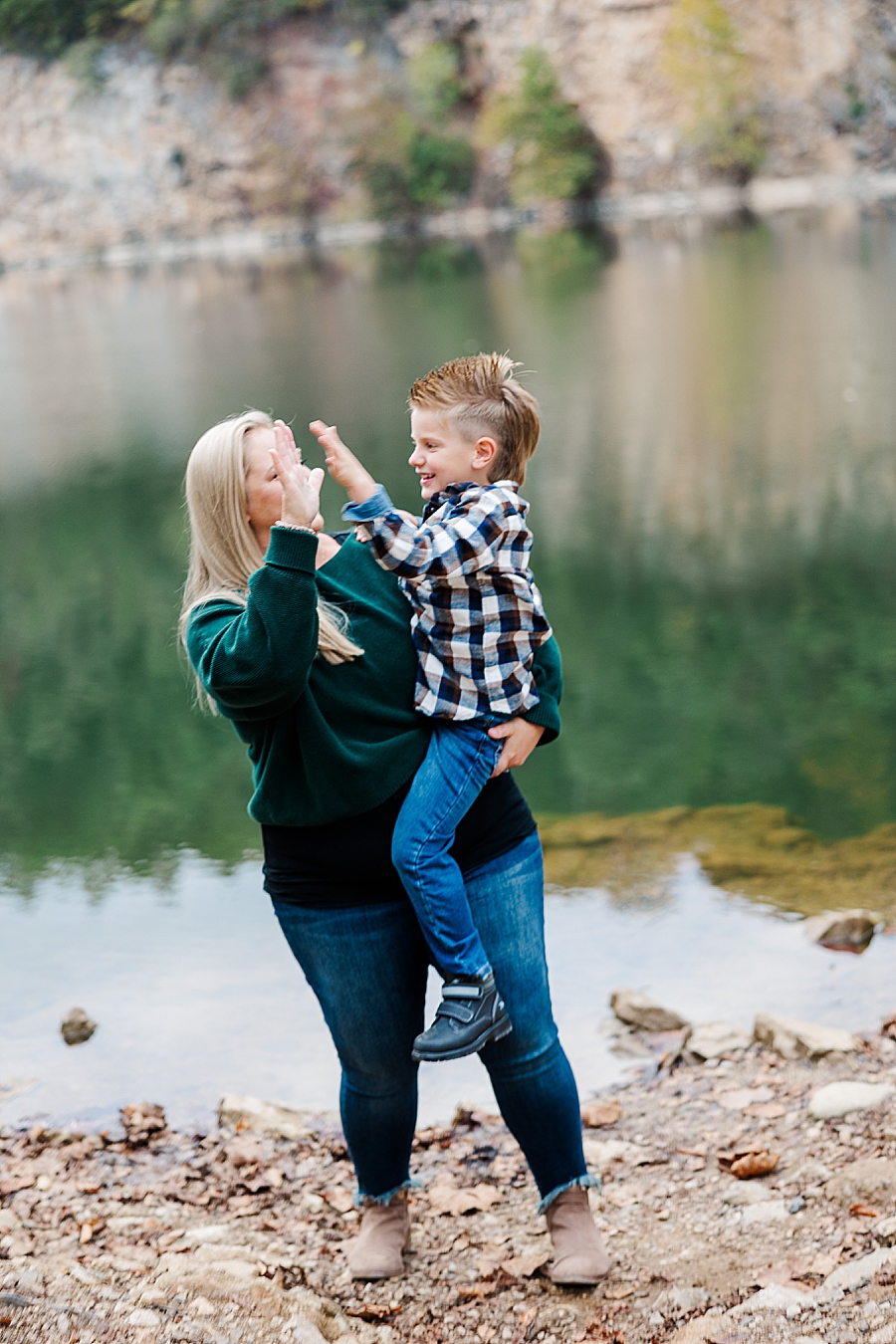 mom high fiving son at mead's quarry family session