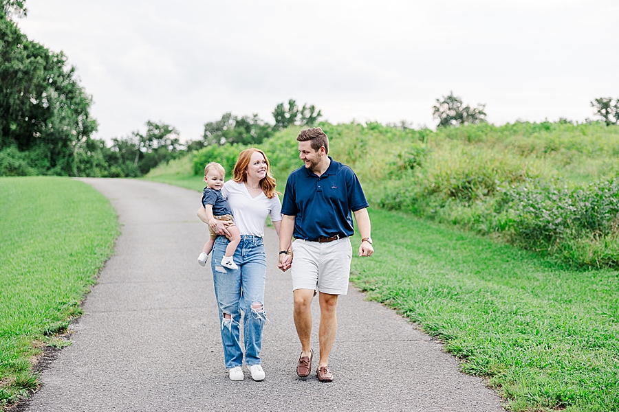 family of 3 walking down path