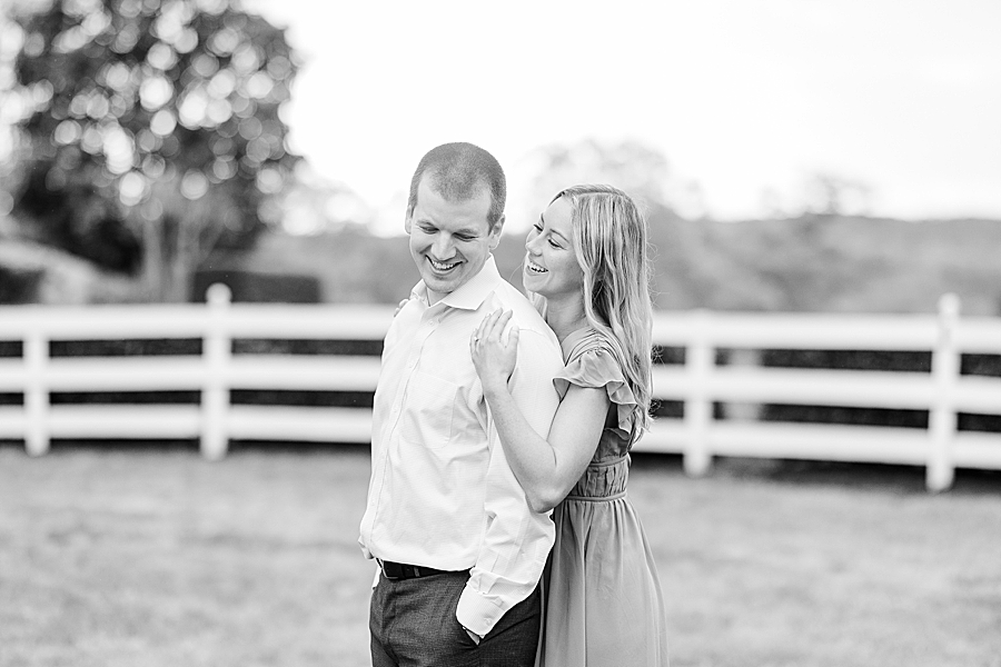 Wrapping arms around him at Castleton Engagement by Amanda May Photos