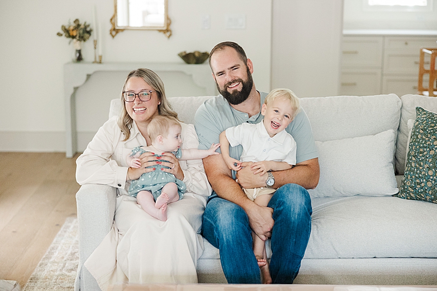 family sitting on couch during nashville lifestyle