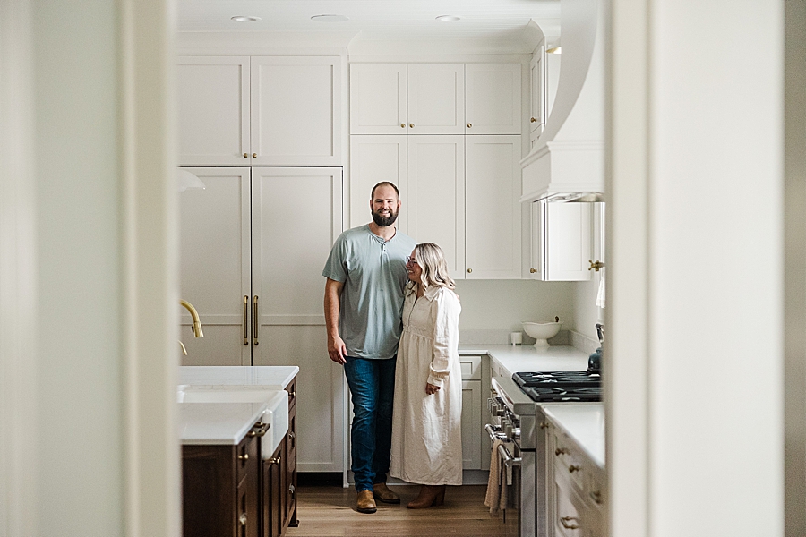 couple standing in kitchen