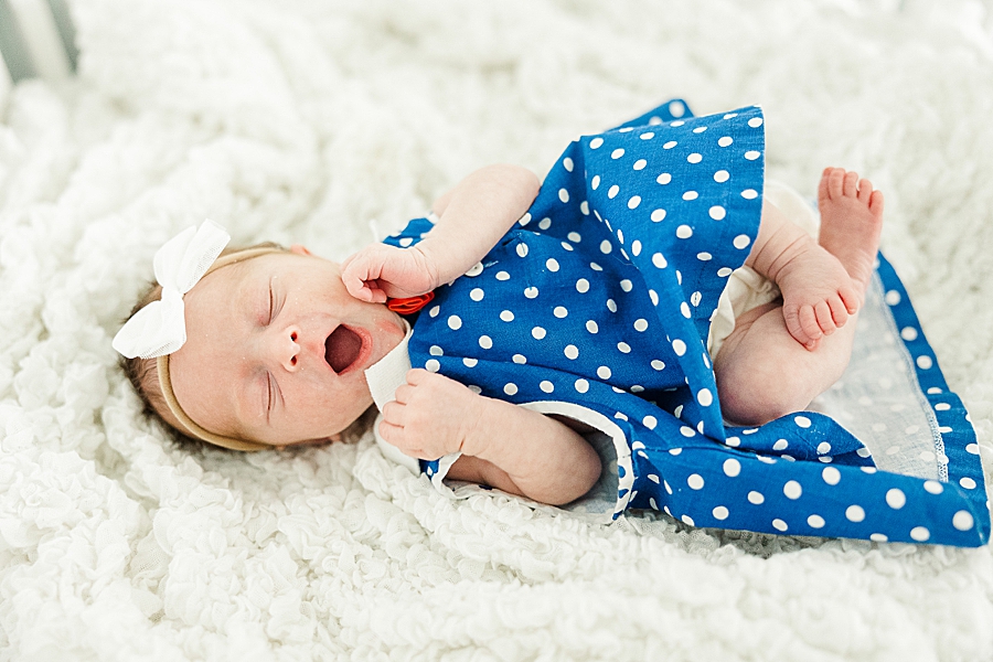 newborn in polka dot dress