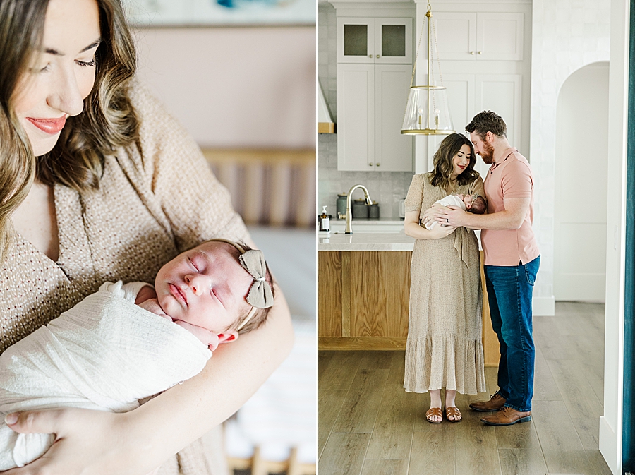 mom holding newborn daughter