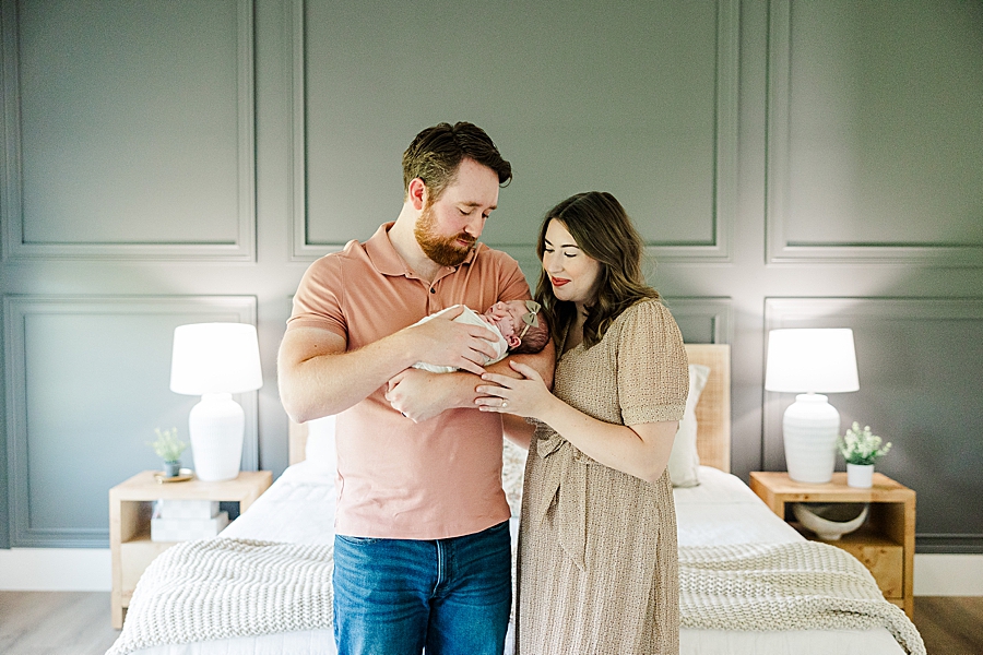 new parents with newborn daughter