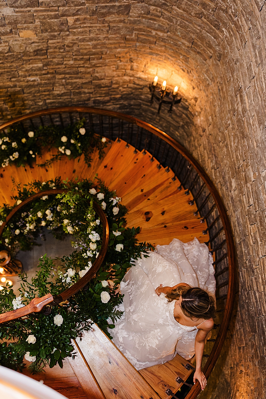 bride walking down stairs at page road estate