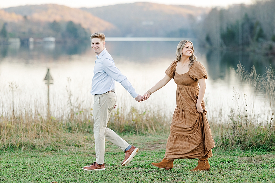 couple walking by water