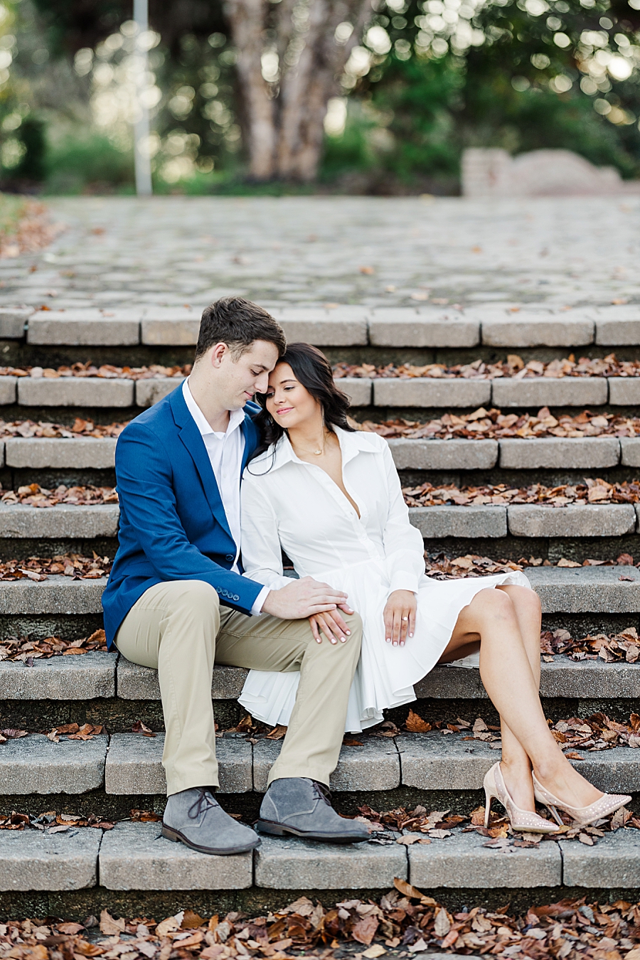 couple on stairs at puppy engagement