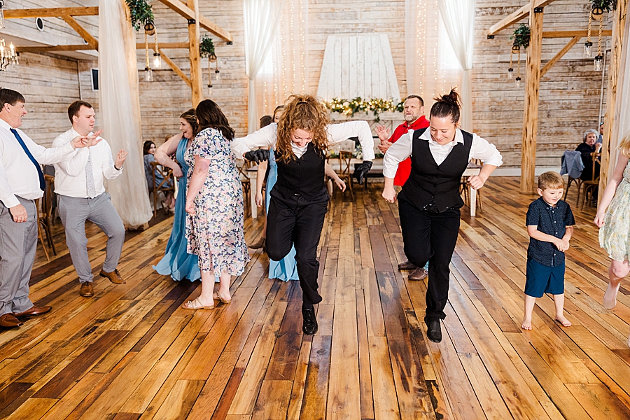 Vendors dancing at wedding by Amanda May Photos