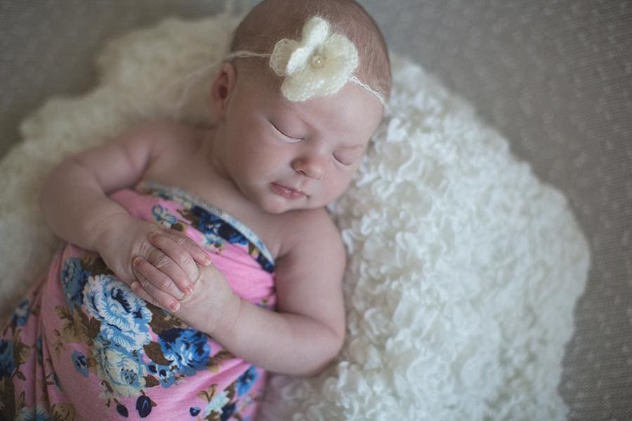 Fingers locked on her chest at this Nashville newborn session by Knoxville Wedding Photographer, Amanda May Photos.