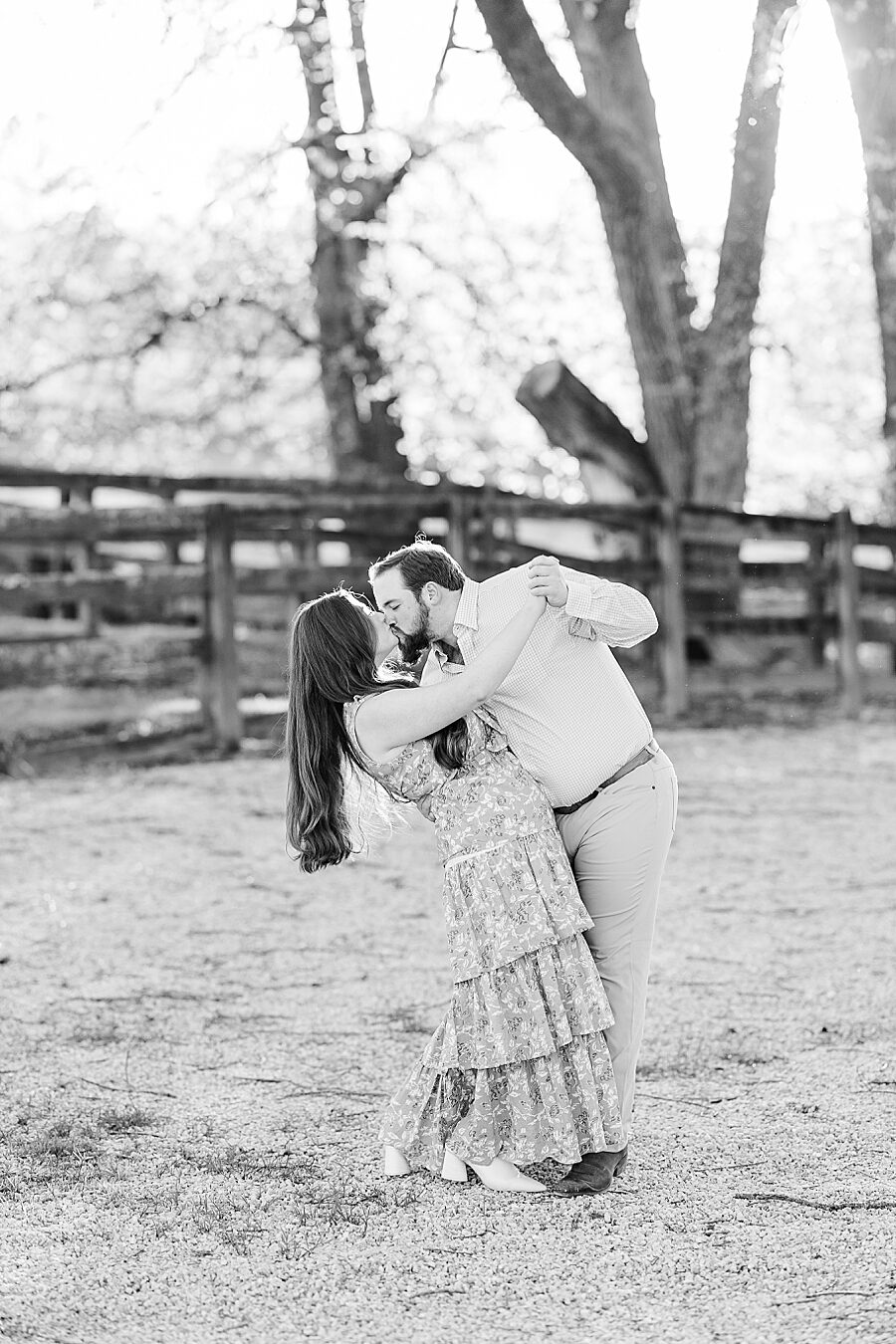 Leaning in for a kiss during session by Amanda May Photos