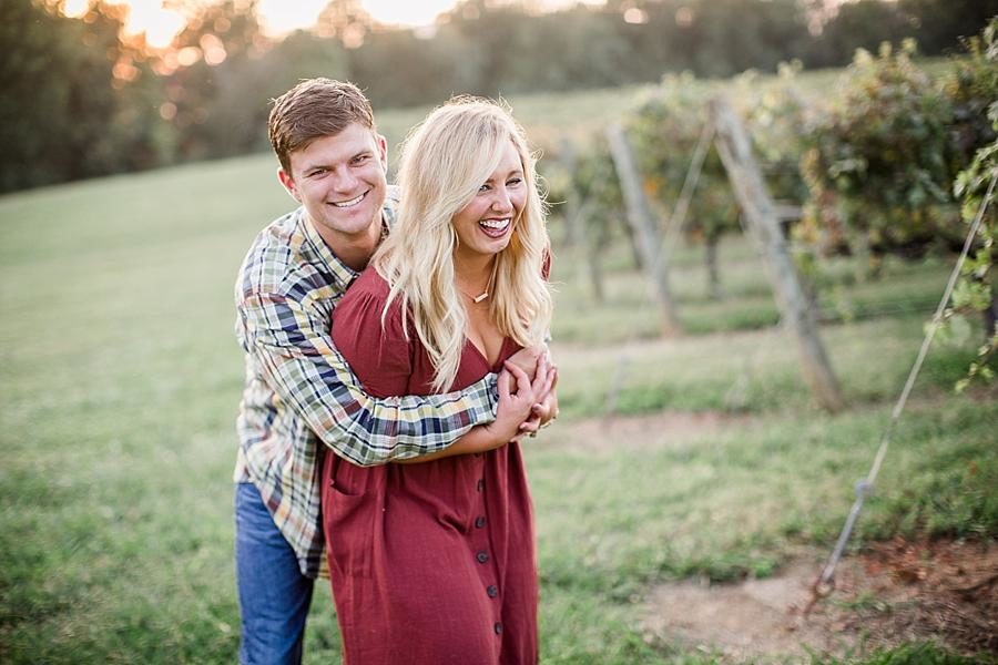 Hug from behind at this Spout Springs Vineyard Family Session by Knoxville Wedding Photographer, Amanda May Photos.