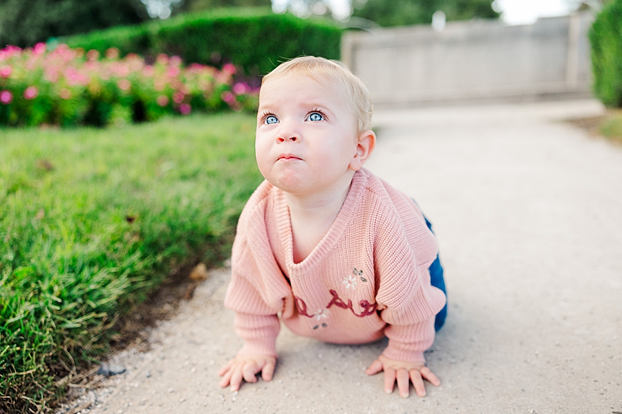 baby crawling on sequoyah hills park sidewalk