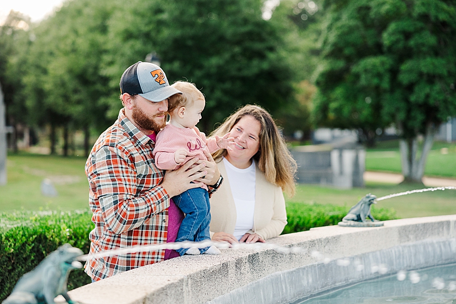 family playing in sequoyah fountain