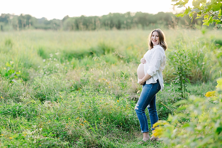 mama to be holding baby bump