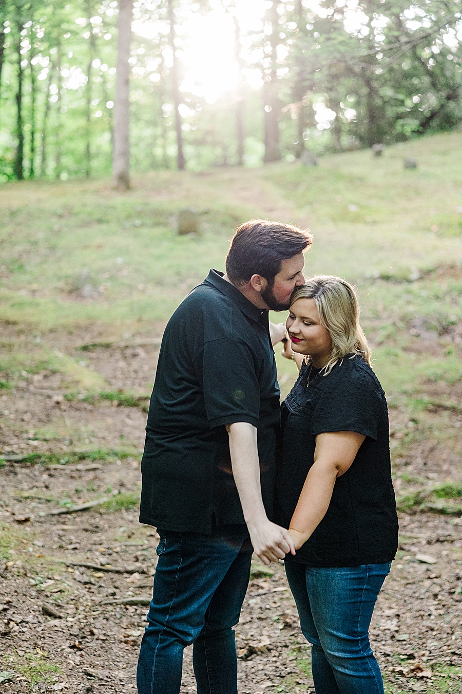 kiss on forehead during smoky mountain engagement