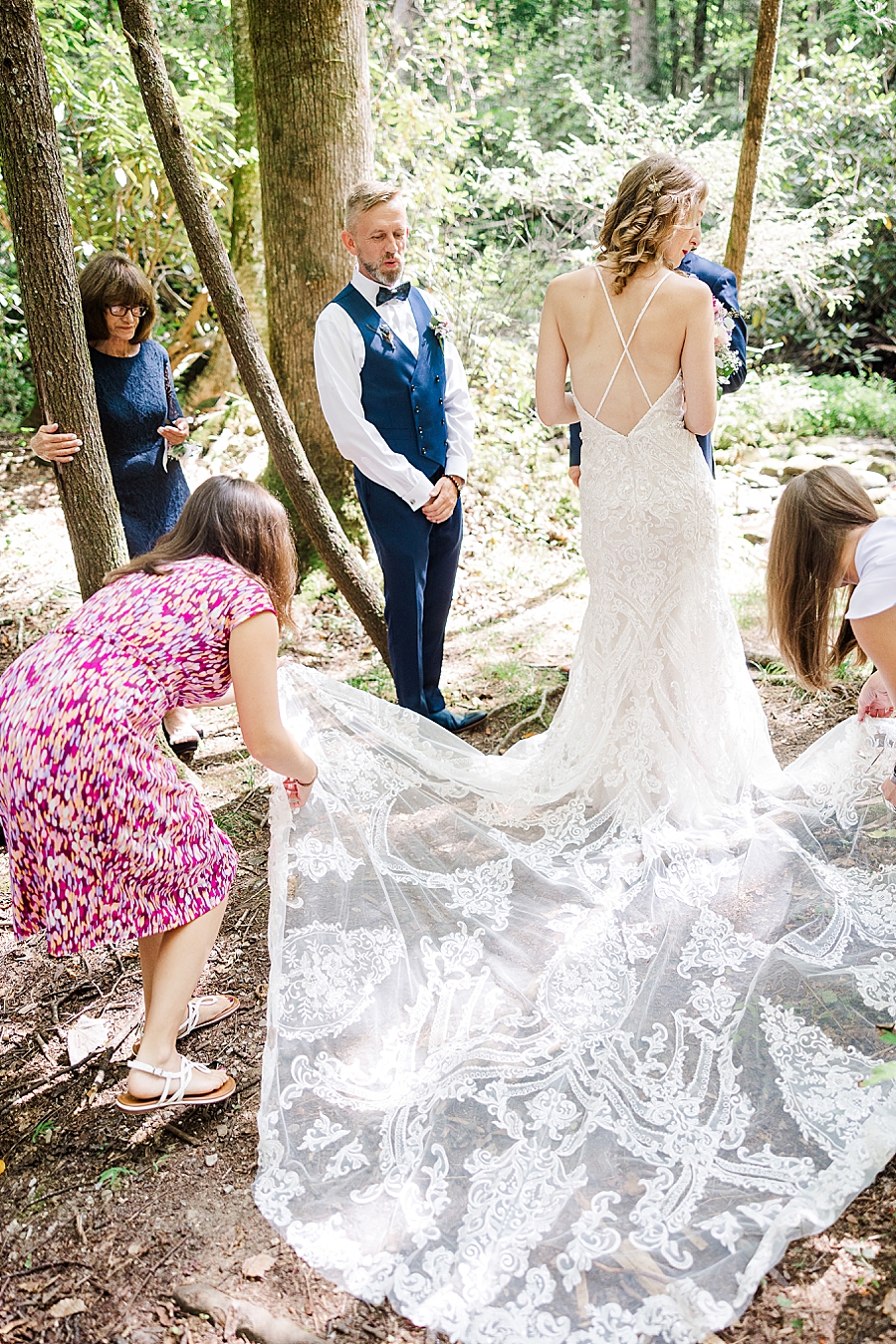 fluffing the wedding dress