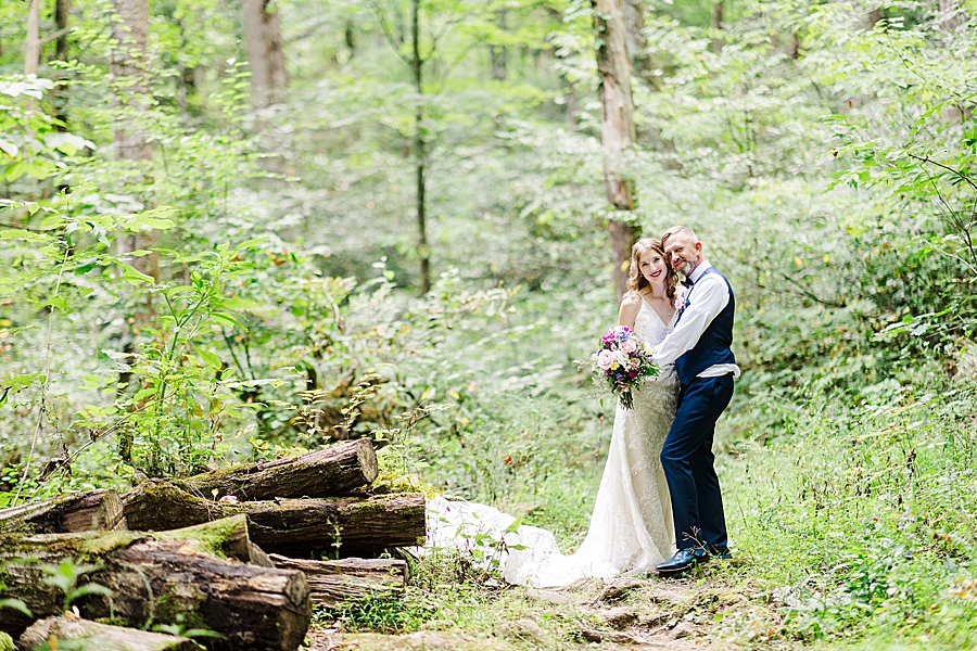 couple in forest after smoky mountain wedding