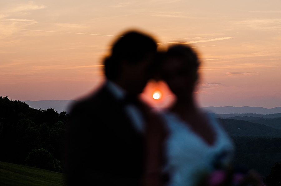 Mountain sunset behind bride and groom at styled shoot by Amanda May Photos