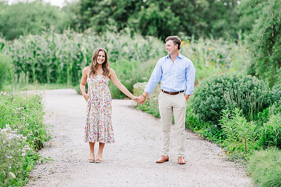 holding hands at summer engagement
