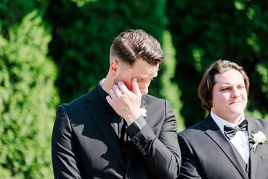 emotional groom after seeing bride