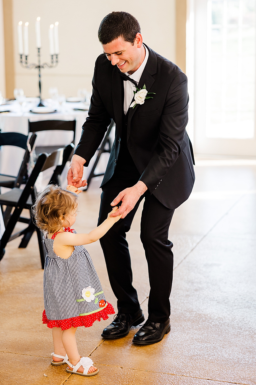 dad dancing with little girl