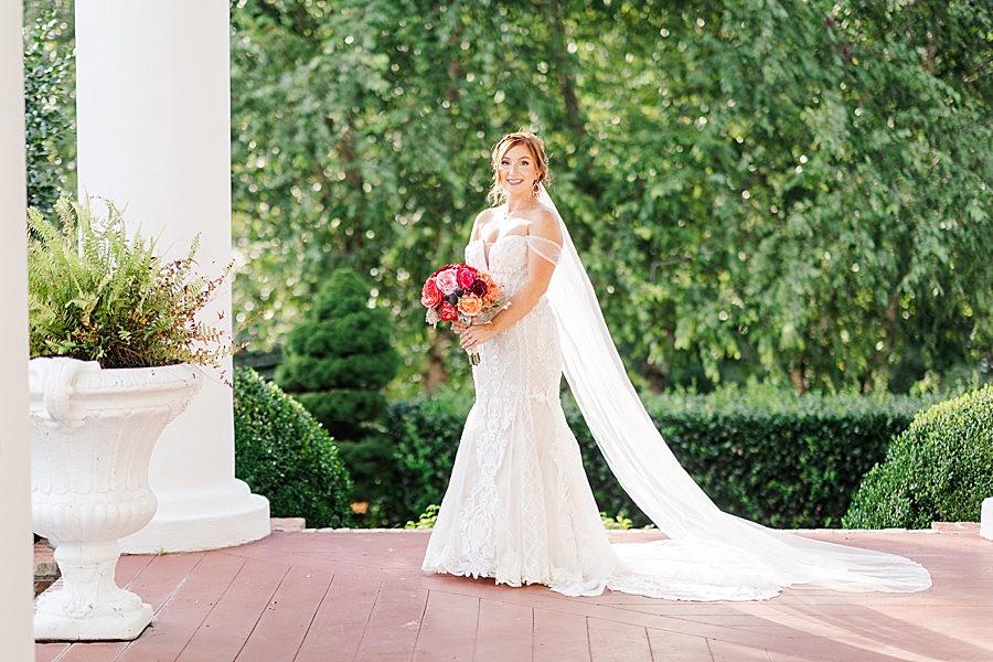 bride on front porch at sunny castleton farms