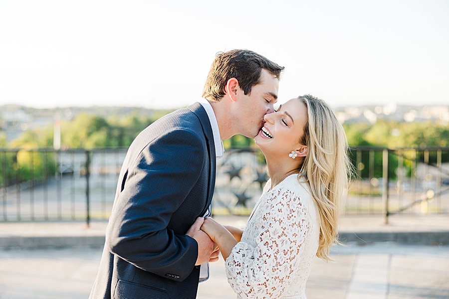 couple laughing during tennessee capitol engagement session