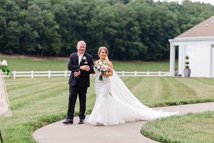 walking down the aisle at the carriage house