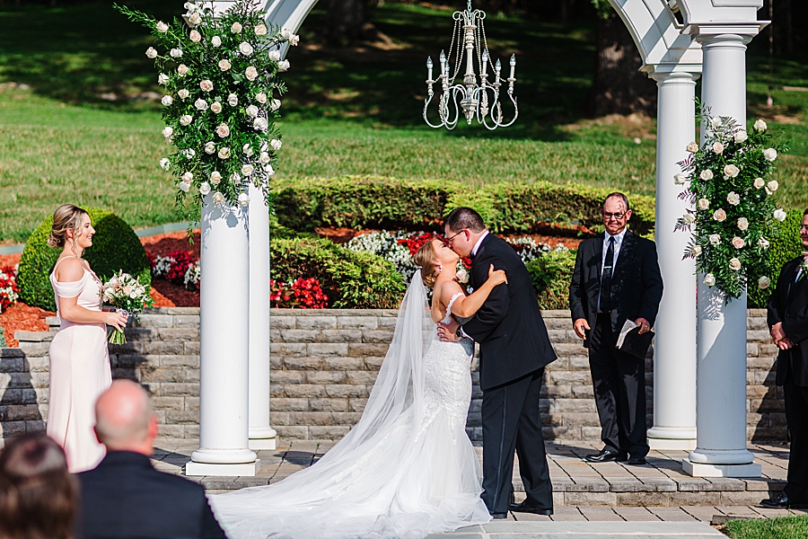 you may kiss the bride at the carriage house
