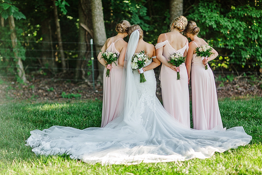 bride and bridesmaids at the carriage house