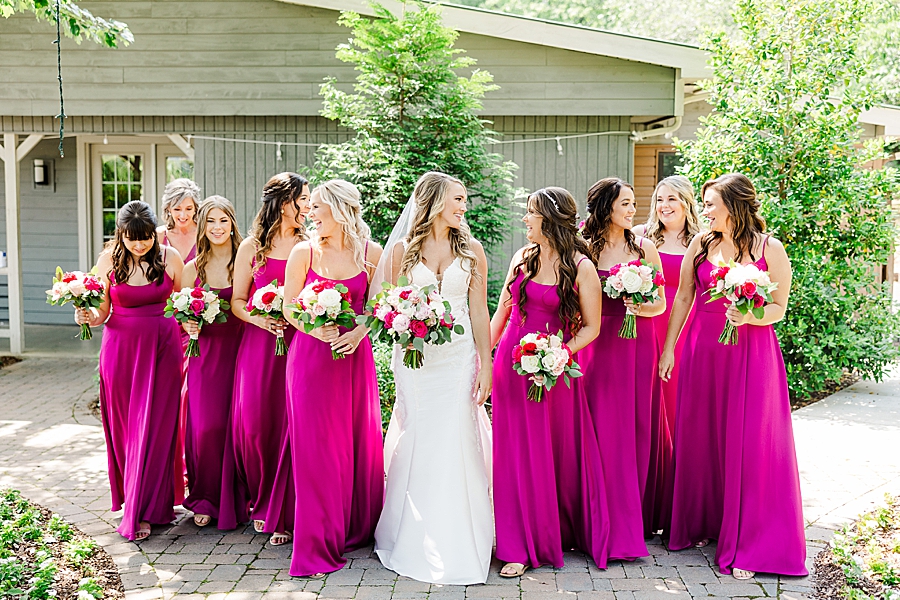 bridesmaids wearing fuchsia dresses