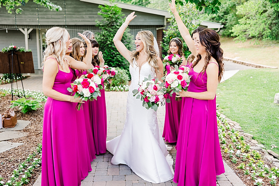 bride high fiving bridesmaids at the venue chattanooga