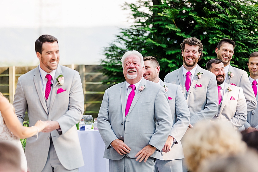 best man laughing during ceremony