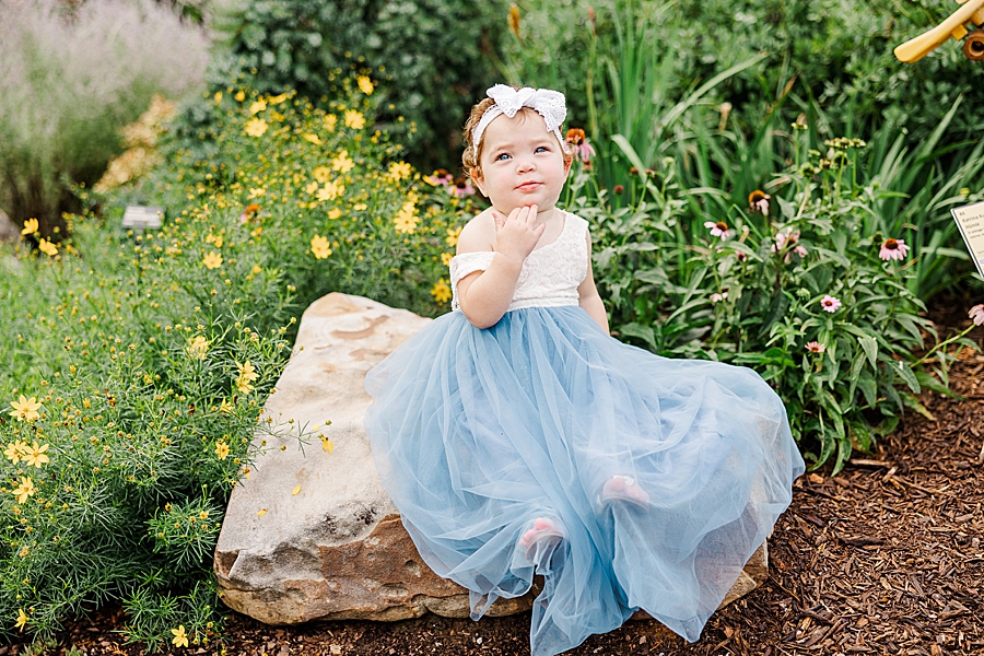 baby in blue dress at ut gardens watermelon session