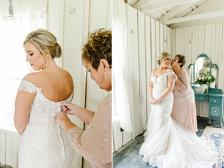 mother zipping wedding dress