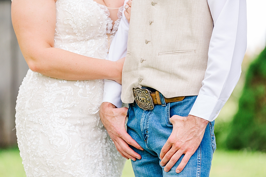 groom with hands in pockets