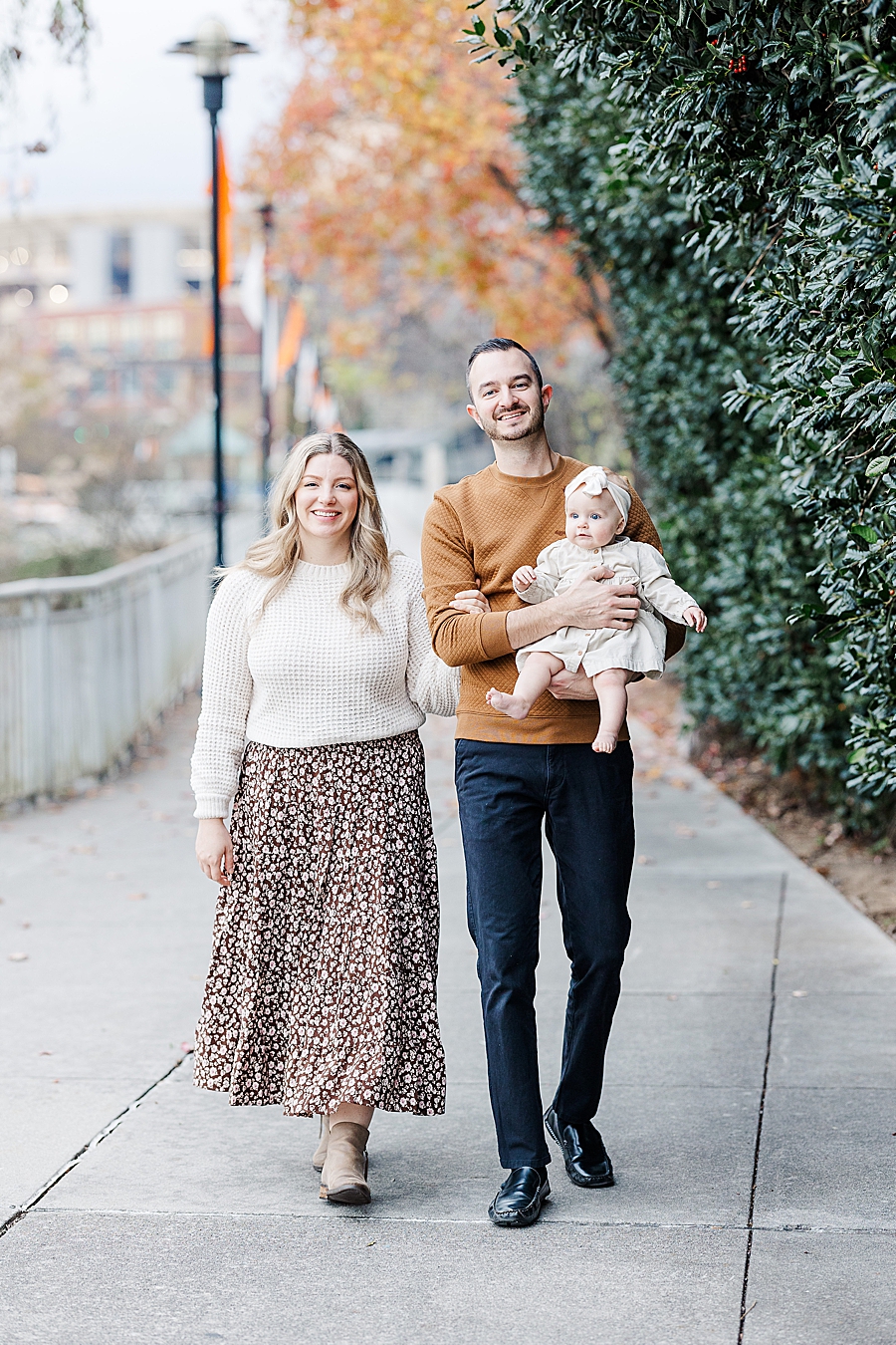 family of three at volunteer landing 9 month session