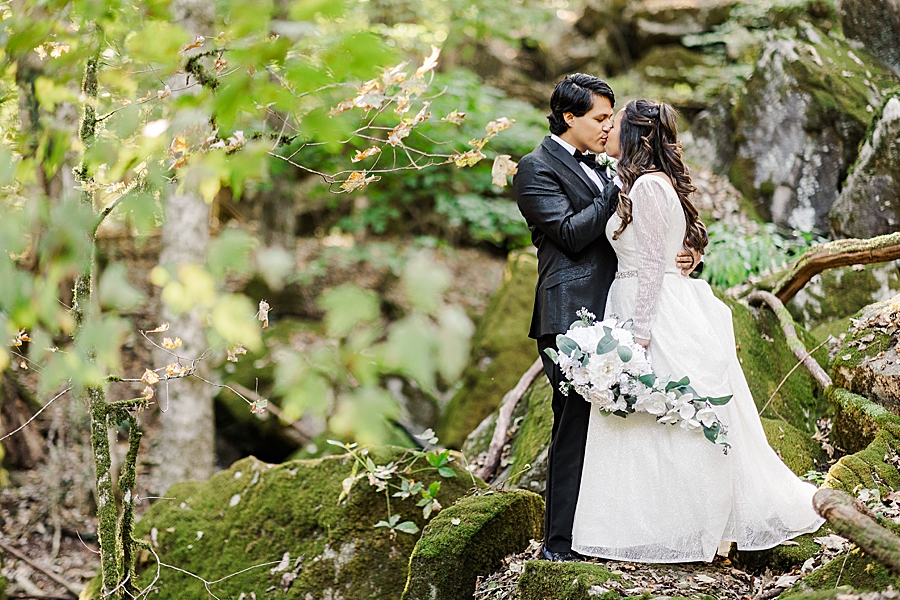 kissing at wedding at the quarry