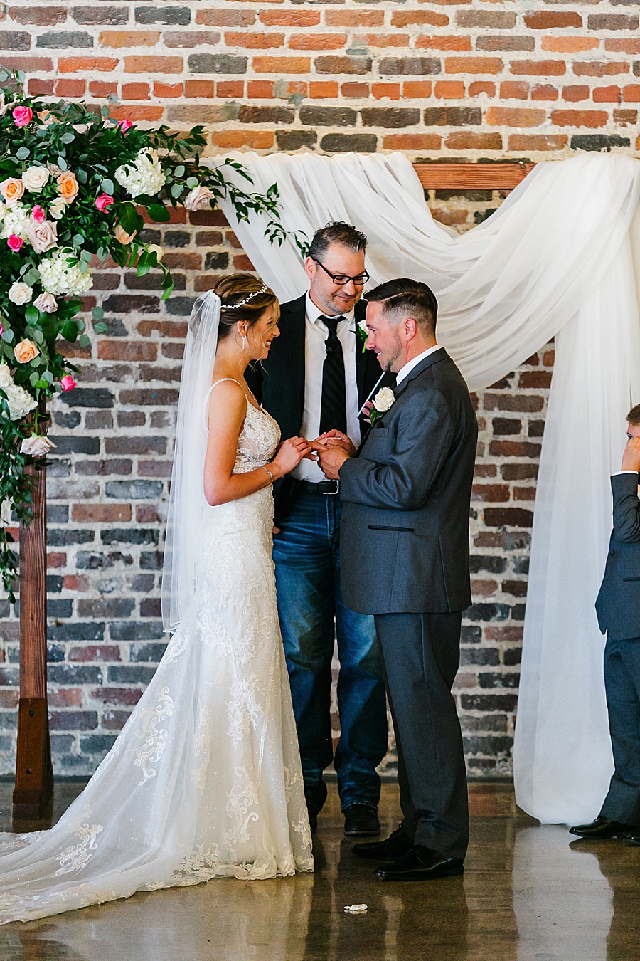 exchanging rings at a wedding at the press room