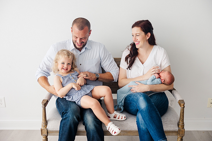 white room baby boy newborn session