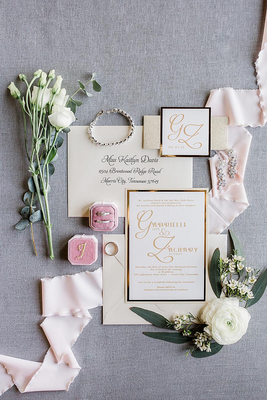 Invitation suite flat lay at this WindRiver Wedding Day by Knoxville Wedding Photographer, Amanda May Photos.