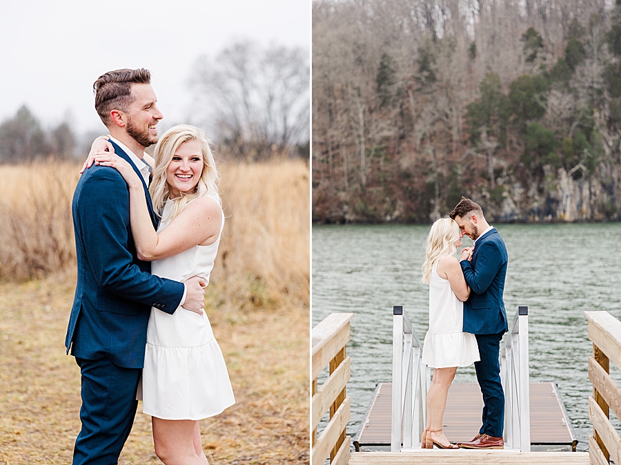 couple standing on dock by water
